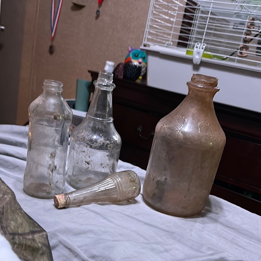 Old antique glass bottles found where ol house was dumped